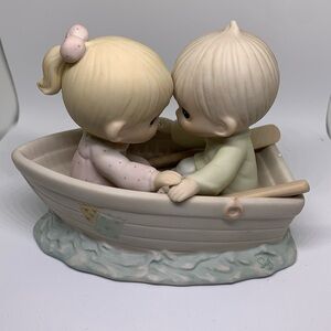 Vintage precious moments “Friends Never Drift Apart” figurine.